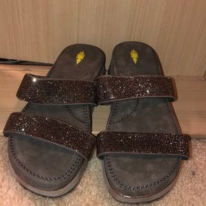 Volatile platform sandals